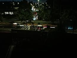 Catania, cartellone pubblicitario nella notte