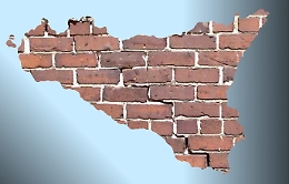 Quel muro che non c'è più e i troppi che restano ancora da abbattere (anche in Sicilia)