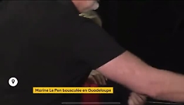 Marine Le Pen spintonata durante trasmissione tv