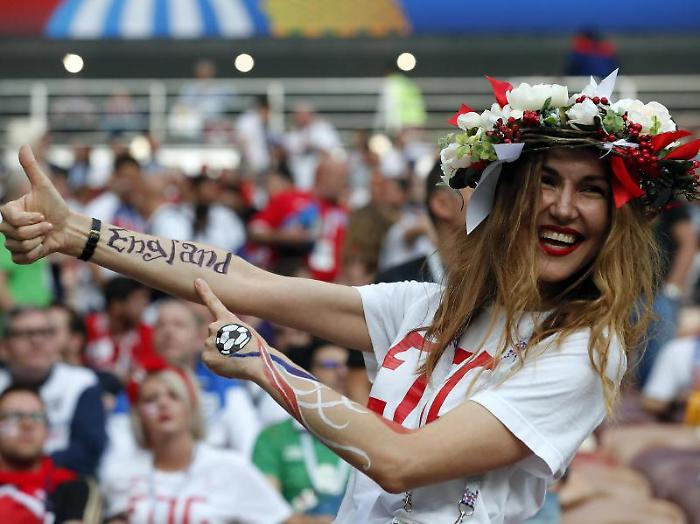 epa06881084 A fan of England poses before the FIFA World Cup 2018 semi final soccer match between Croatia and England in Moscow, Russia, 11 July 2018