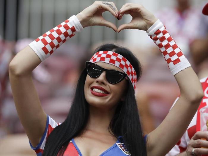 A fan gestures before the final match between France and Croatia at the 2018 soccer World Cup in the Luzhniki Stadium in Moscow, Russia, Sunday, July