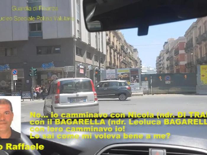 Un fermo immagine tratto da un video della guardia di finanza mostra un intercettazione ambientale durante l'operazione della Finanza che ha portato 