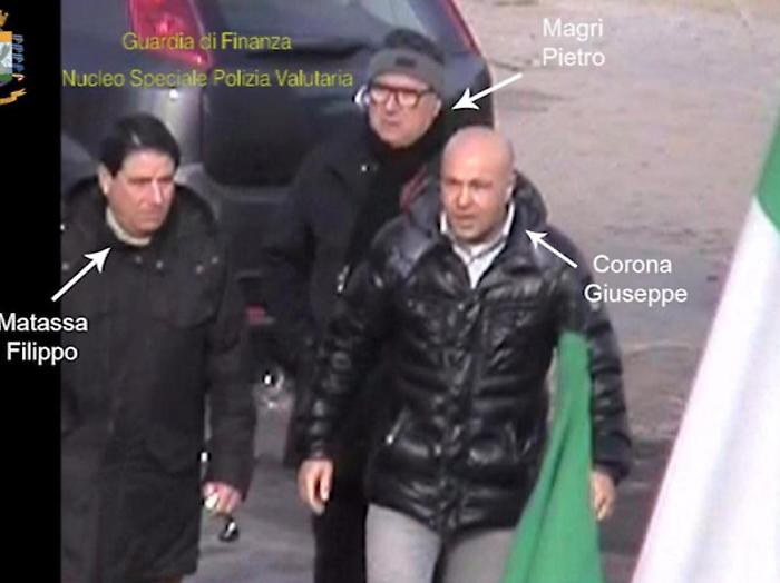 Un fermo immagine tratto da un video della guardia di finanza mostra un intercettazione ambientale durante l'operazione della Finanza che ha portato 