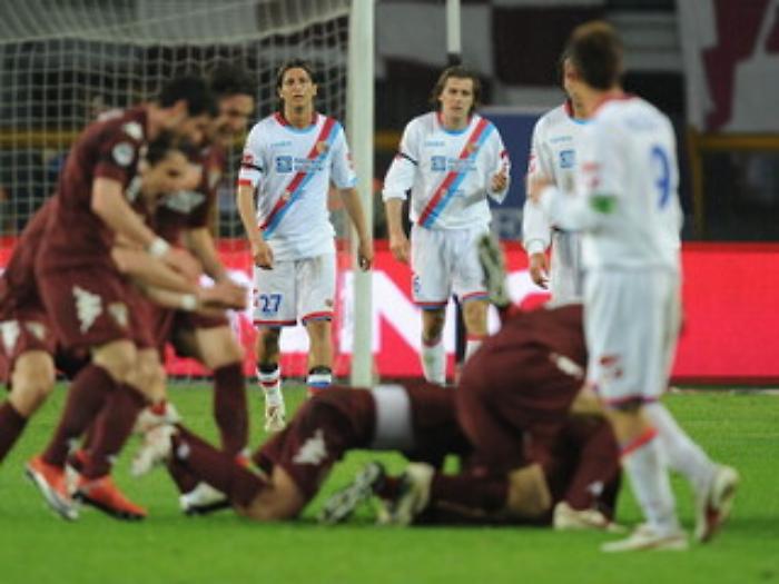 incontro di calcio torino - catania; biagianti e stovini