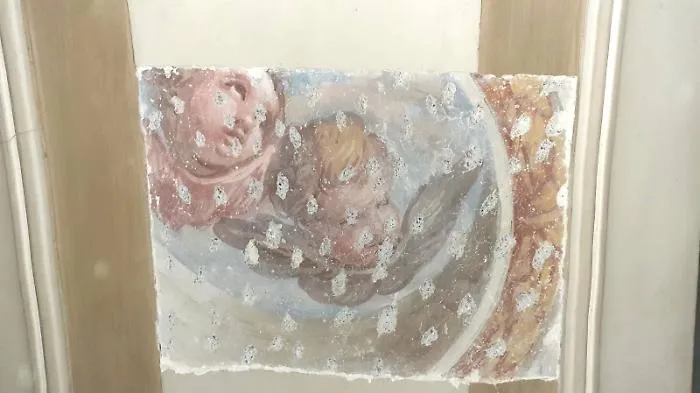 CT_San-Benedetto-dettaglio-putti-affiorati-da-sotto-intonaco