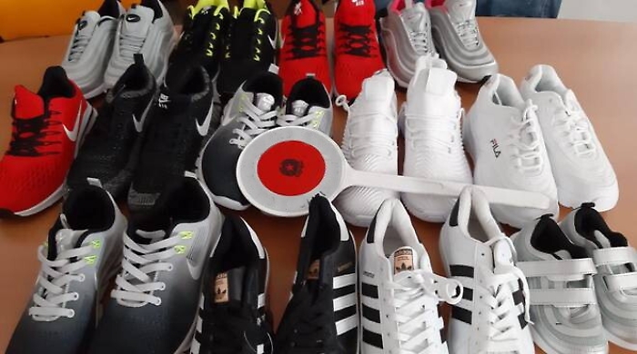 La filiera delle scarpe contraffate: 
otto arresti tra Roma e Catania