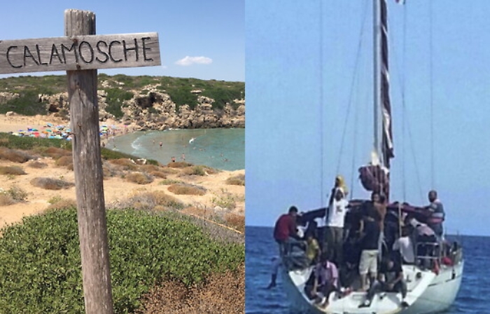 Sbarco di migranti in barca a vela sulla spiaggia di Calamosche