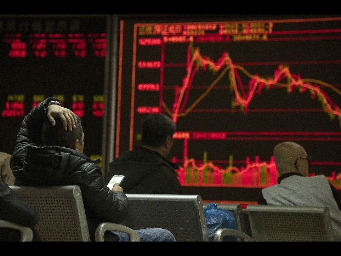 Borsa Asia piatta, deboli listini cinesi