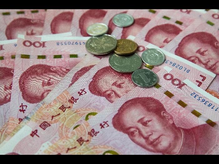 Cina fissa cambio yuan sopra le attese