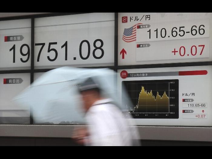 Borse asiatiche calano dopo rally