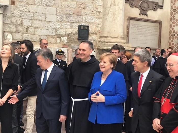 Merkel ad Assisi per ricevere Lampada