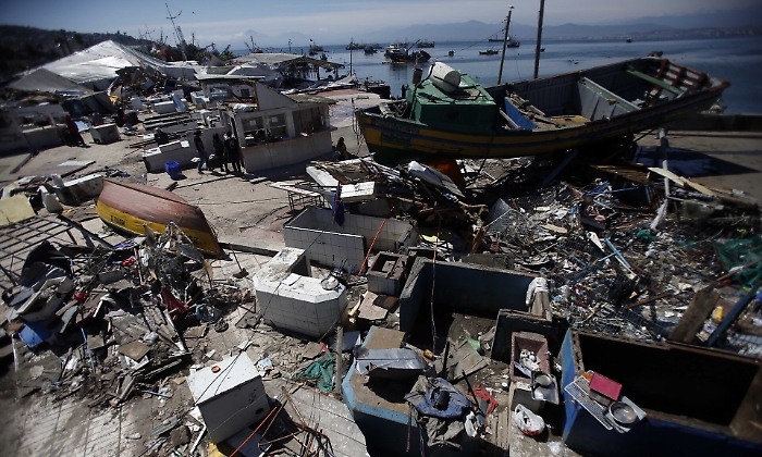 How did Chile manage to survive its recent earthquake virtually unscathed?