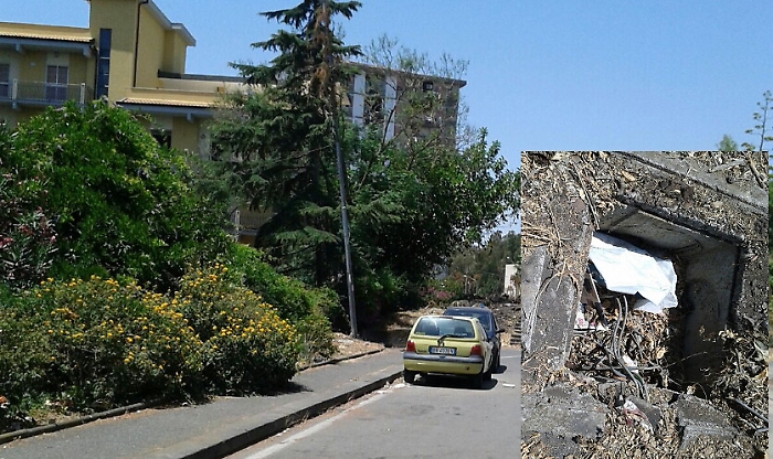 Catania, palo della luce inclinato e pozzetto scoperto in via Rossini