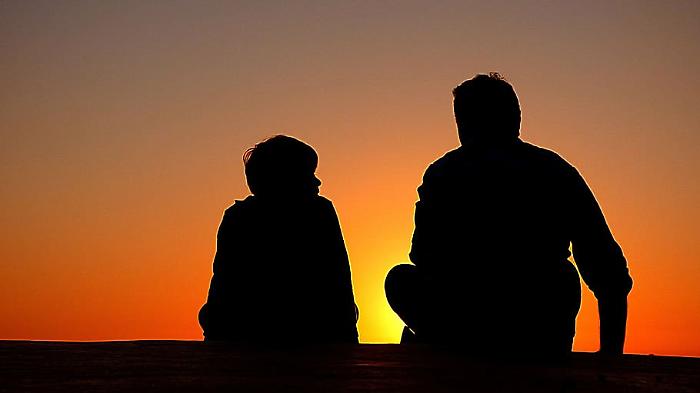 silhouette-father-and-son-sundown-chat