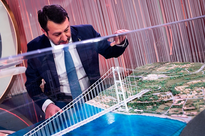Italian Minister Salvini shows the bridge project over the Strait of Messina
